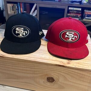 Pair of SF 49ers worn New Era 7 5/8 fitted hats. Black and Red